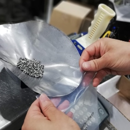 Gould Fasteners Employee Measuring screws Gould Fasteners Employee Measuring screws